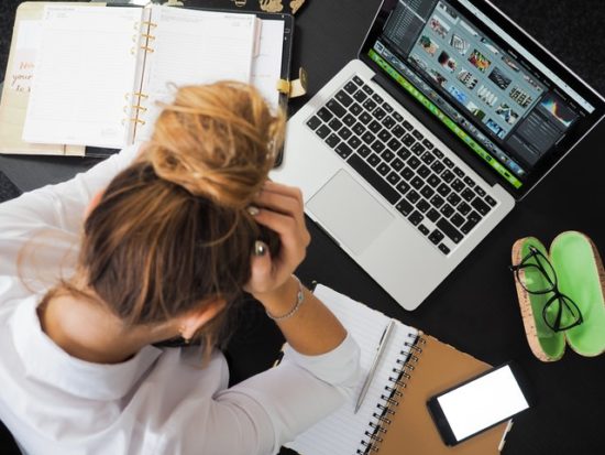 woman stressed out at computer