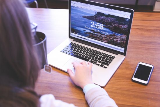woman browsing on laptop